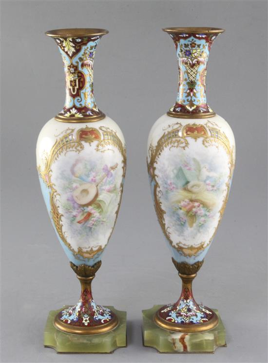 A pair of French champlevé enamel and porcelain vases height 12.25in.